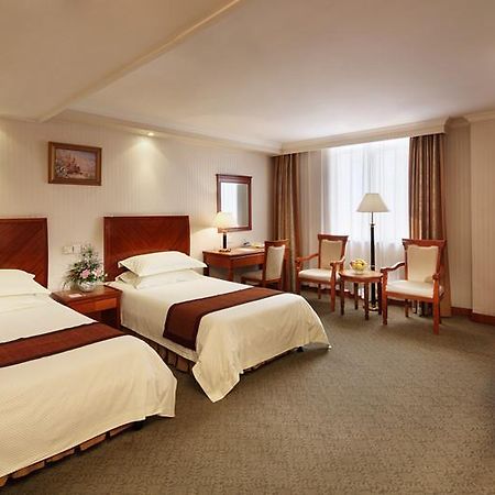 Jin Jiang Metropole Hotel Шанхай Номер фото